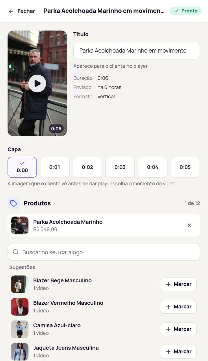 Detalhe de um vídeo com título, escolha da capa e a lista de produtos marcados, com sugestões do catálogo e o botão Marcar